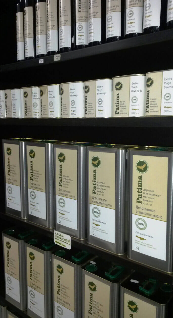 Olive oil in bottles and tins